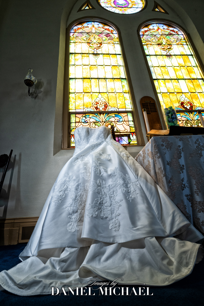Wedding Dress Hanging in Church