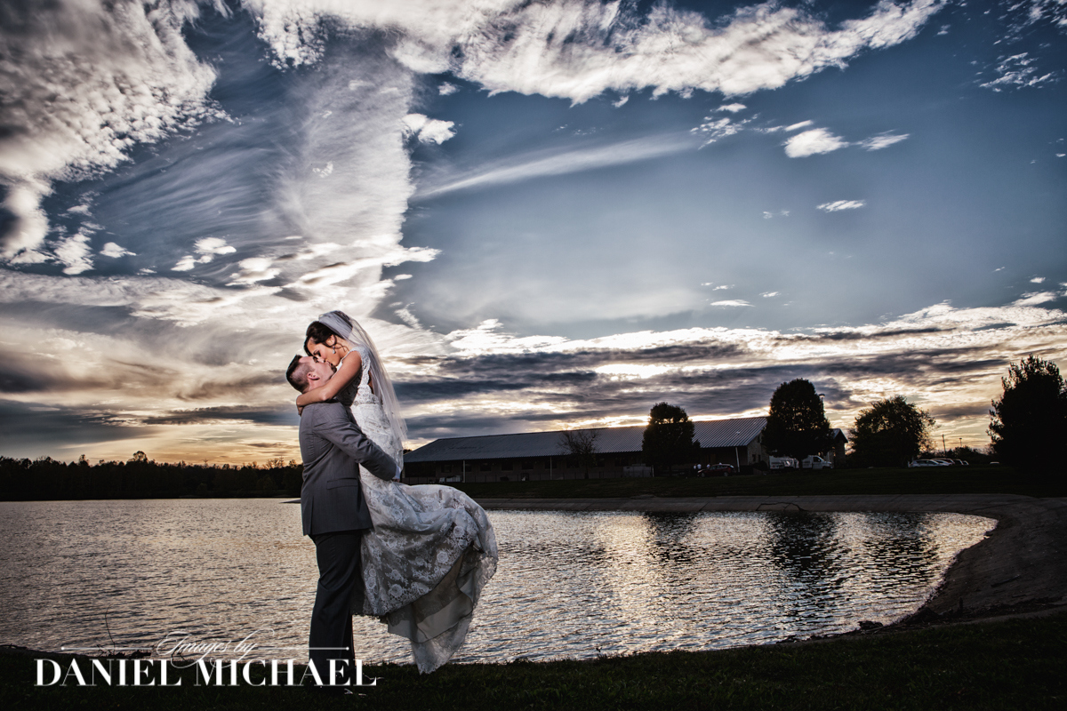 lake lyndsey, cincinnati, wedding photographer, sunset, bride and groom kissing
