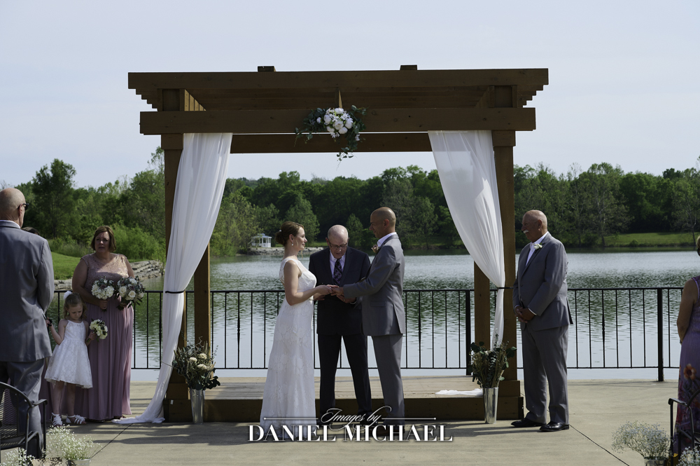 Couple getting married near lake