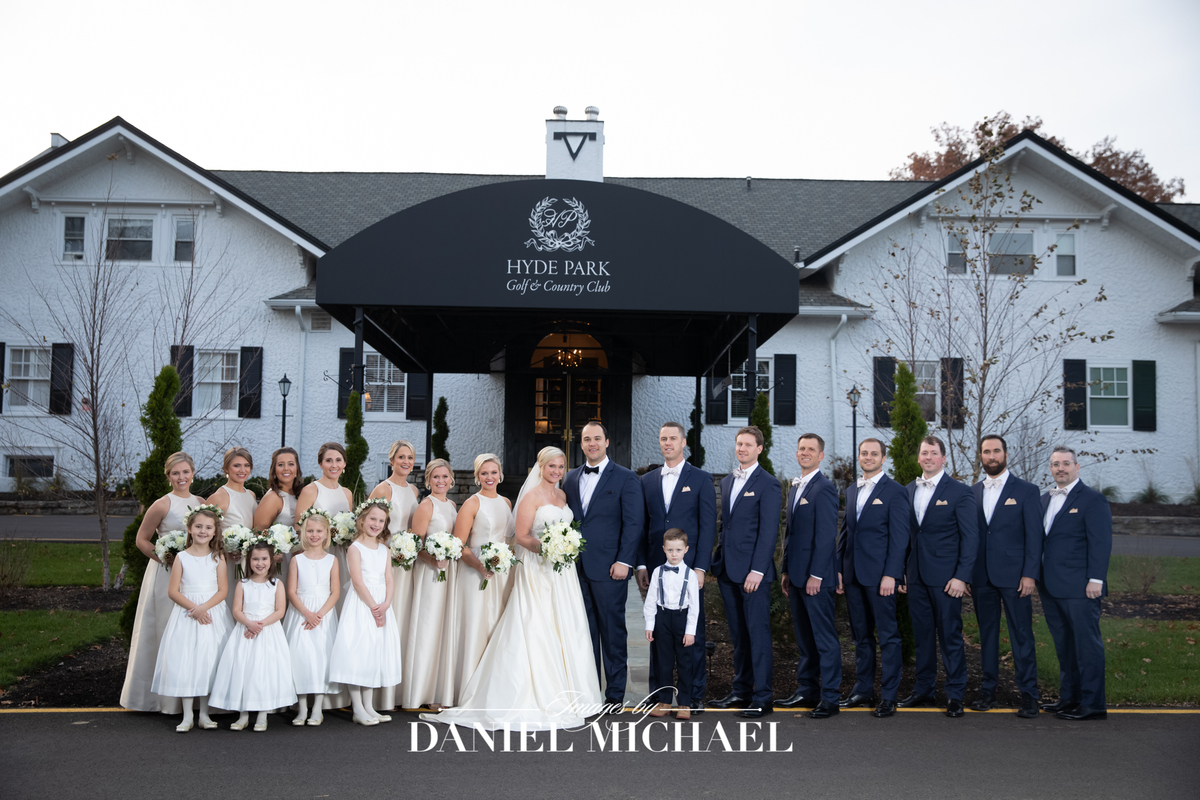 Wedding party in front of Hyde Park Country Club Wedding Venue