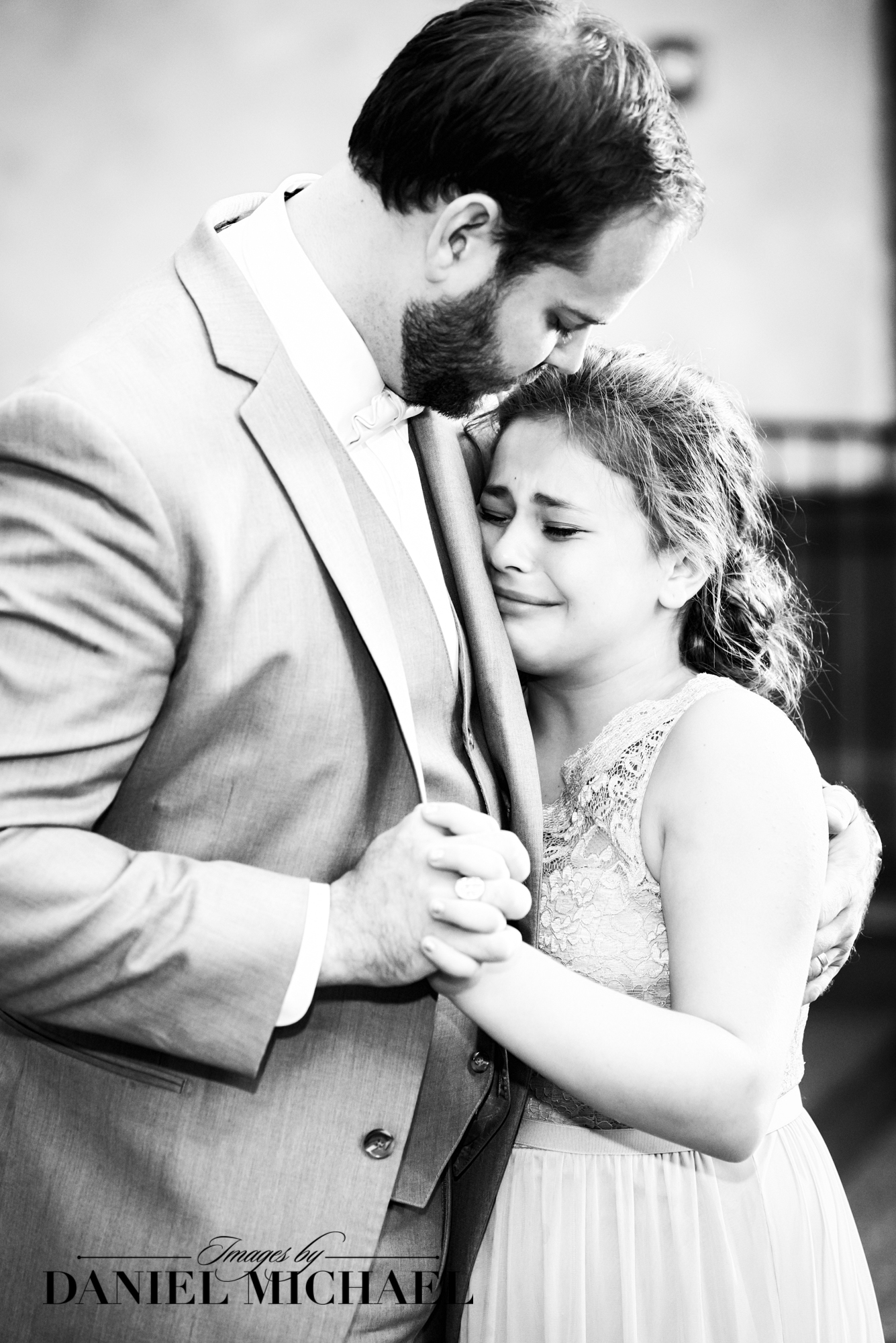 Groom Dancing with Daughter at Wedding