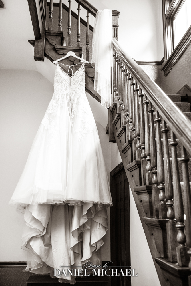 Wedding Dress Hanging from Stairs