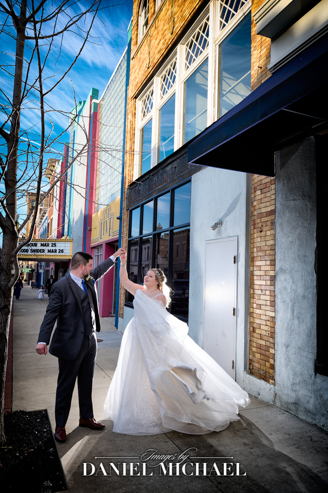 Wedding Photography Downtown Groom Spinning Bride
